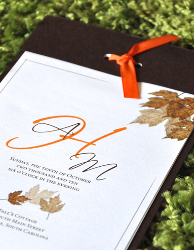 Fall wedding program using colors orange and brown with orange ribbon designed by Jennifer Pellin