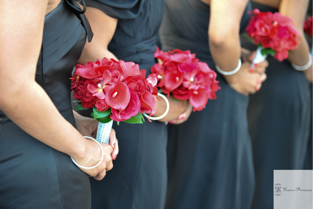 Bridesmaids holding flowers at Harvey B. Gantt Center